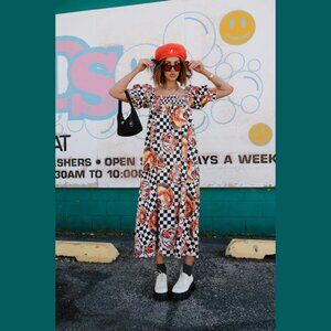 Palm Springs Smocked Dress in Lions, Tigers, Check, Oh My!